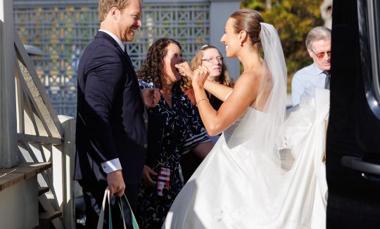 Wedding transportation in Manchester Vermont with chauffeur opening car door